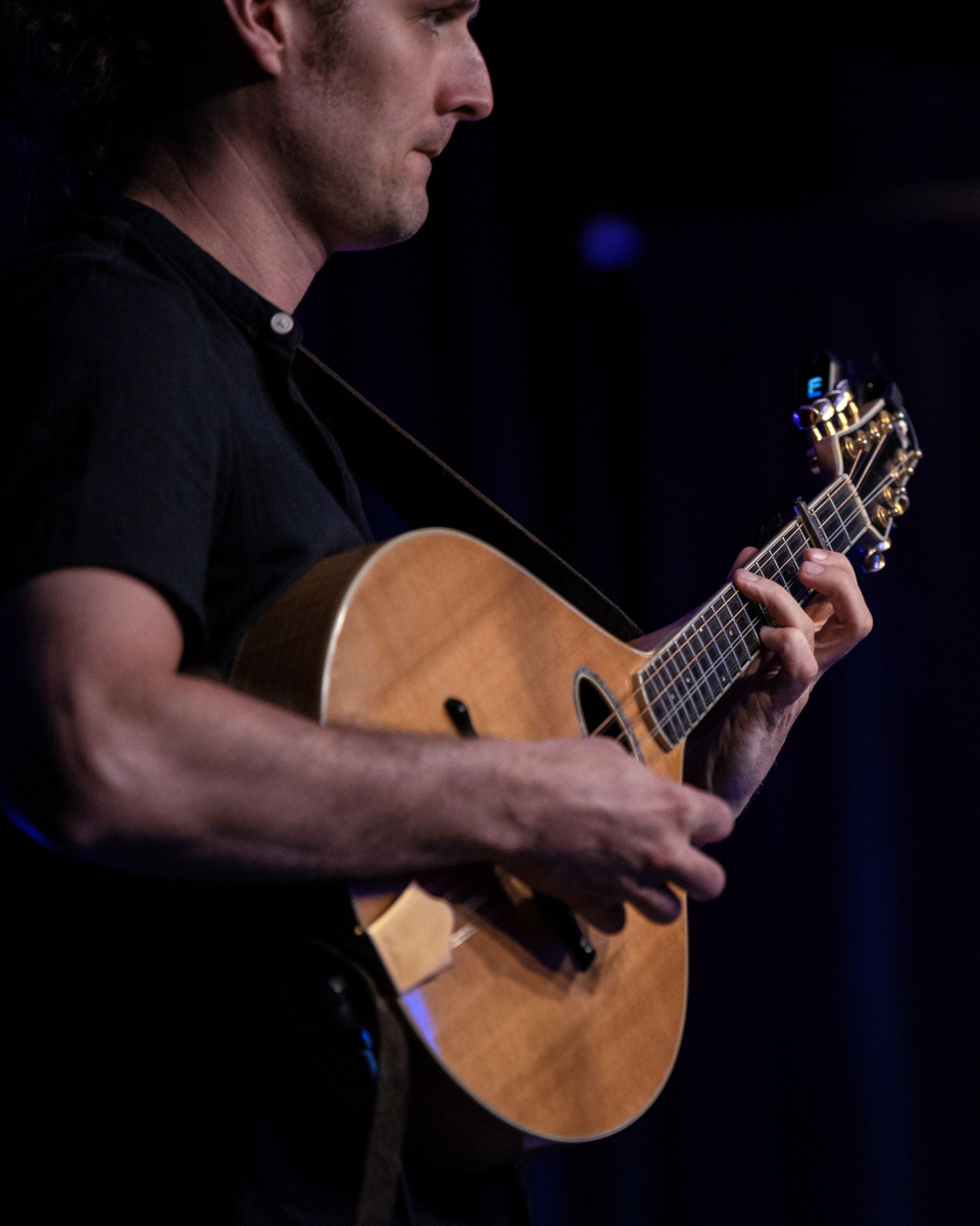 multi-instrumentalist Duncan Wickel plays bouzouki