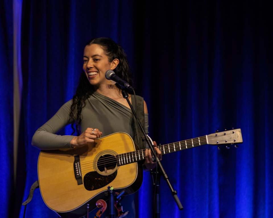 folk artist Lily Henley plays guitar